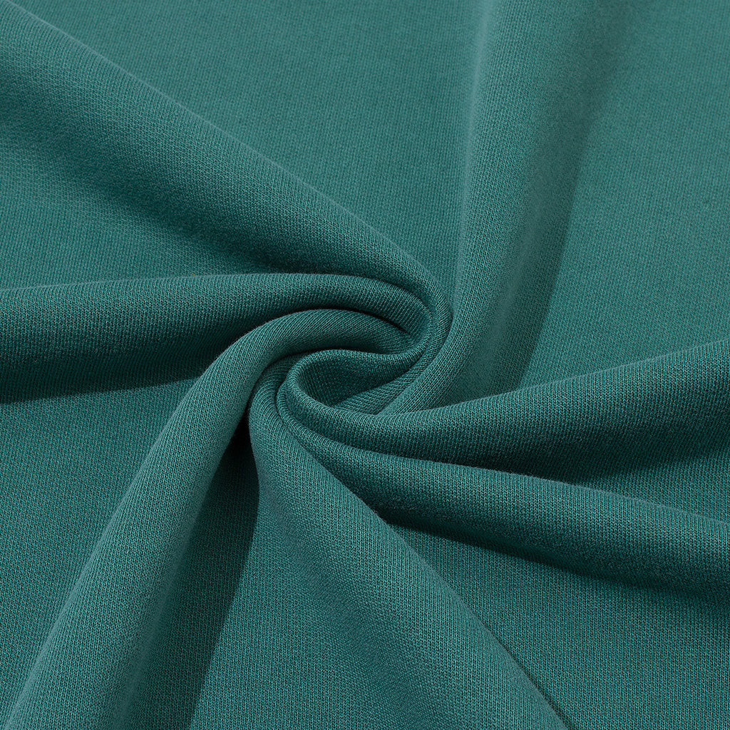 תקריב פרטי הבד והגימור של חולצת JINX IT Oversized 260GSM