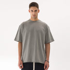 דוגמן לובש JINX FADED RAW – חולצת JINX IT אפורה 260GSM